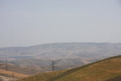 Electric transmission towers and overhead lines on slopes Electric transmission towers and overhead lines on slopes