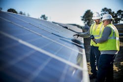 Duke Energy's solar panels and workers Duke Energy's solar panels and workers