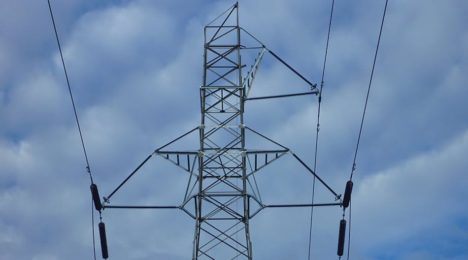 Refurbished transmission line showing replacement akimbo crossarms.