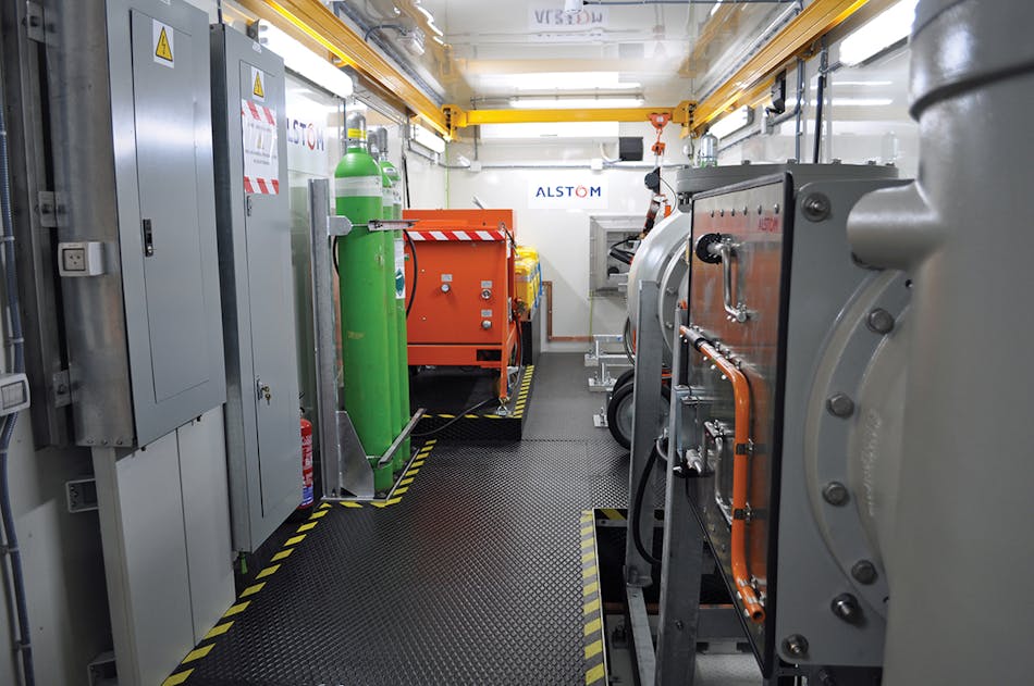 This inside view of the 115-kV mobile GIS trailer shows the AC and DC distribution panels, SF6 gas DILO cart and track-mounted crane.