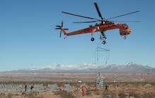 A heavy-lift helicopter is used to erect 160 transmission towers at an altitude of 9000 ft to 12,500 ft in the Pir Panjal range.