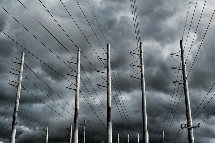 storm behind power lines