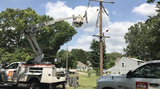 PAR Electric linemen help Kansas City Power &amp; Light to restore power following a summer storm.