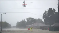helicopter over flooding