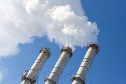 Power plants emitting smoke Power plants emitting smoke