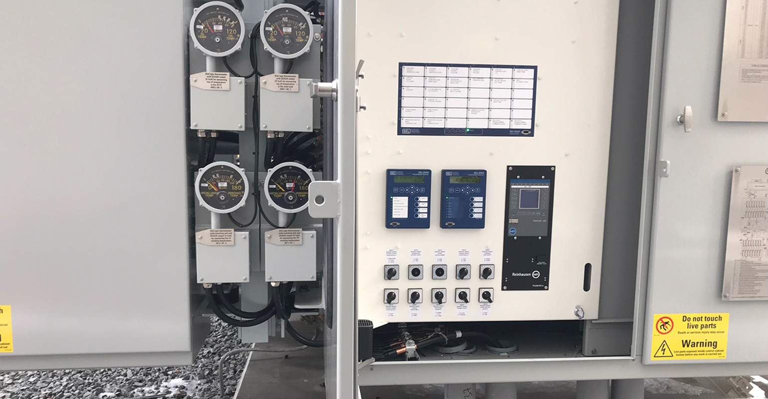 SEL-2414 transformer monitor, SEL-2523 annunciator panel and associated equipment on substation transformer