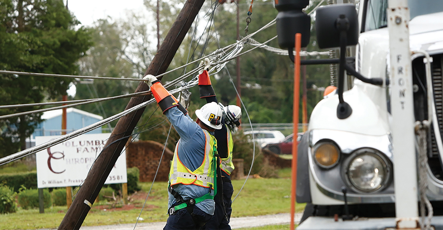 FPL lineworkers work to restore power in areas affected by hurricanes and wildfire