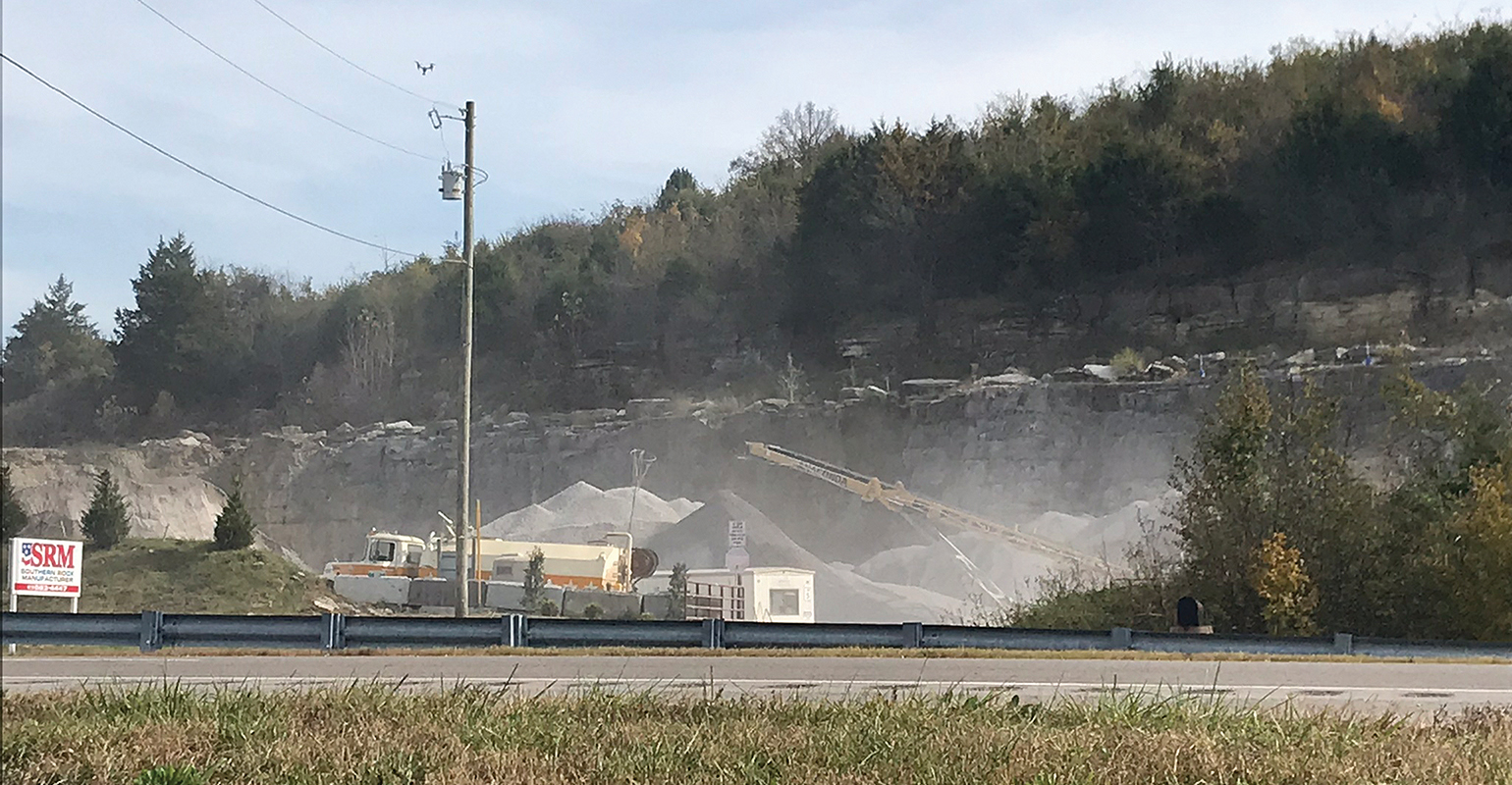 A drone collecting data over a construction site