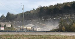 A drone collecting data over a construction site A drone collecting data over a construction site