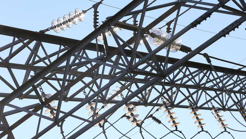 A close-up view of an overhead power line