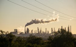 A power plant emitting smoke A power plant emitting smoke