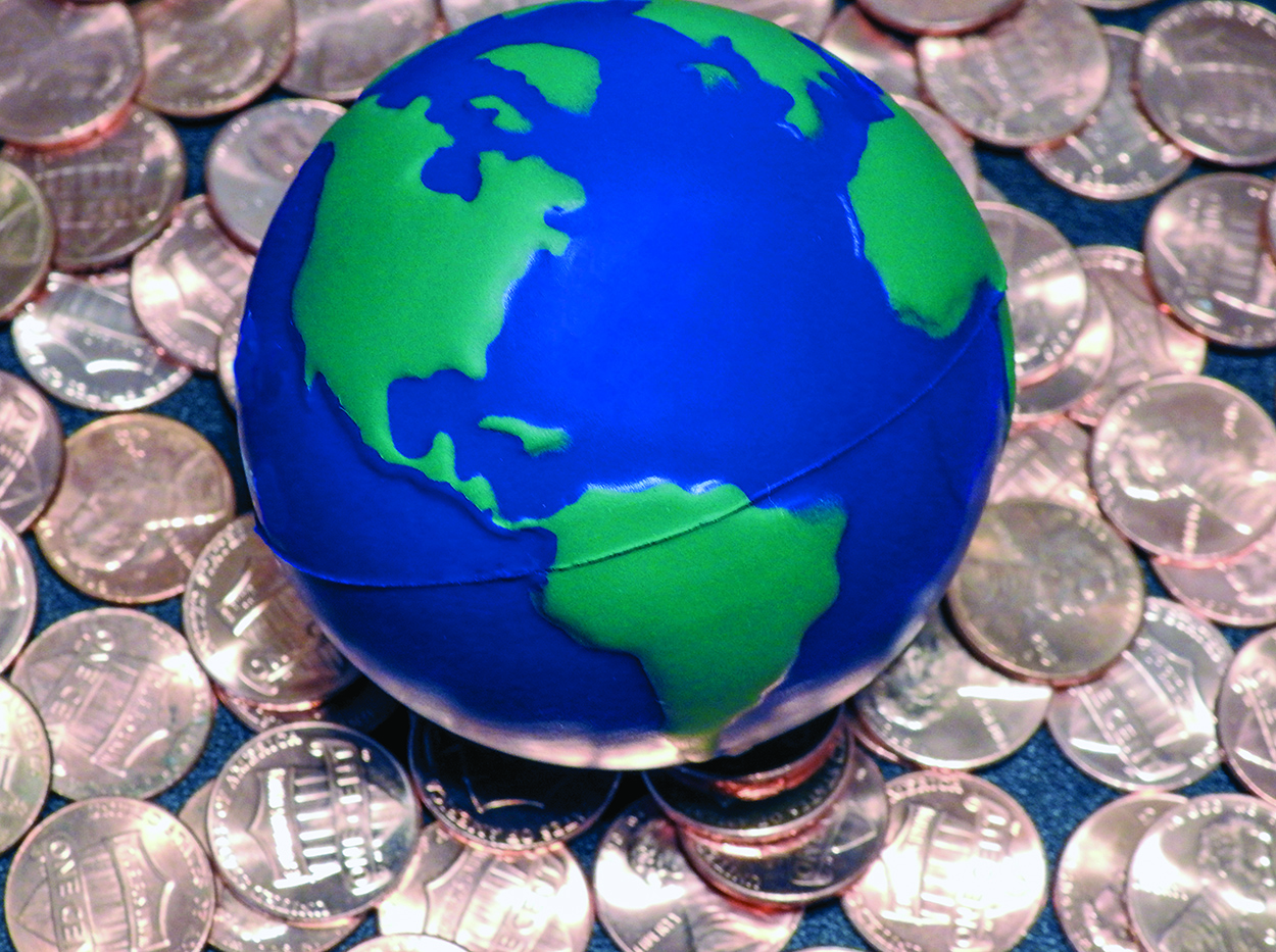 A globe on a range of pennies