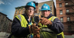 Con Edison staff examining images on IR camera Con Edison staff examining images on IR camera