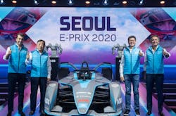 Robot waving checkered flags to unveil the Gen2 car at a media conference in Seoul Robot waving checkered flags to unveil the Gen2 car at a media conference in Seoul