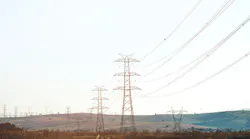 Electric transmission towers and overhead lines