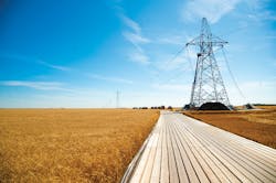 Bipole III HVDC transmission line showing biosecurity matting Bipole III HVDC transmission line showing biosecurity matting