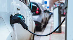 An electric vehicle being charged