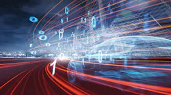A holographic image of a car on the road with a range of binary digits