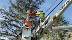 Penn Power line workers install a new TripSaver device on a neighborhood power line in Lawrence County, Pennsylvania. The automated devices are installed on local neighborhood power lines that branch from the main power line serving an area.