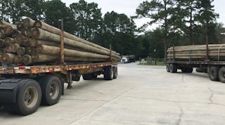 Coastal Electric Membership Corp. received several shipments of new poles at its operations center in Midway, Georgia, in preparation for any restoration work needed after Hurricane Dorian.