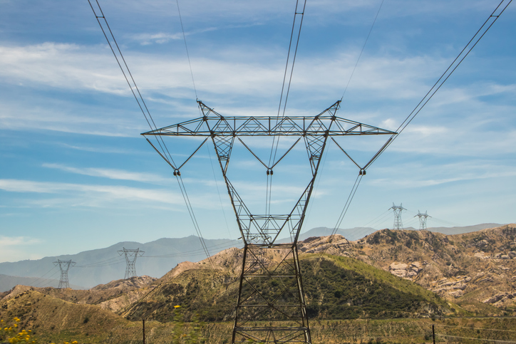 Electric transmission towers and overhead lines