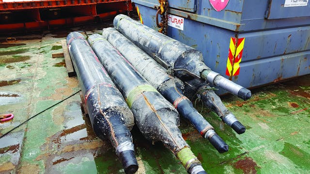 Five recovered 420-kV submarine cable joints.