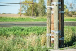 Xcel Energy had enough wood poles on-hand to rebuild the first line, which was installed on driven wood pilings.