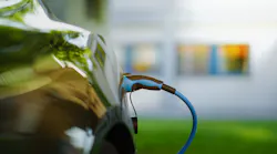 An electric vehicle being charged