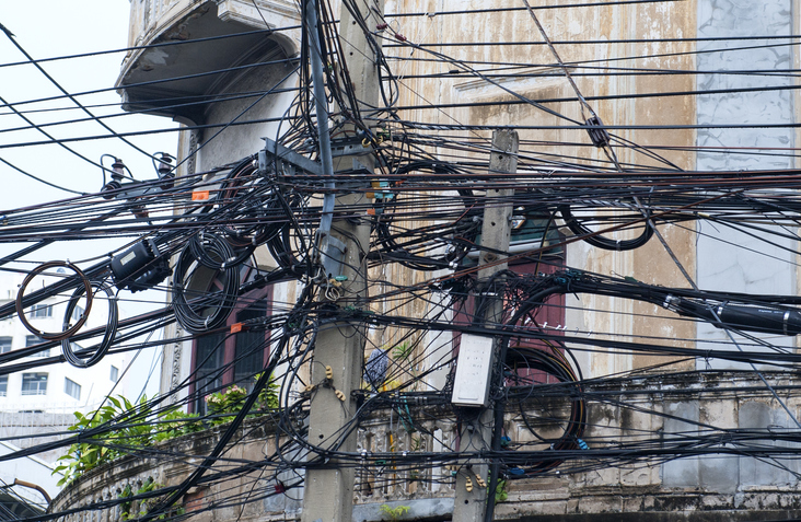Entangled electric wires on an electric pole