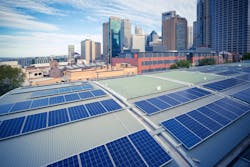 Solar panels on rooftops in a city Solar panels on rooftops in a city