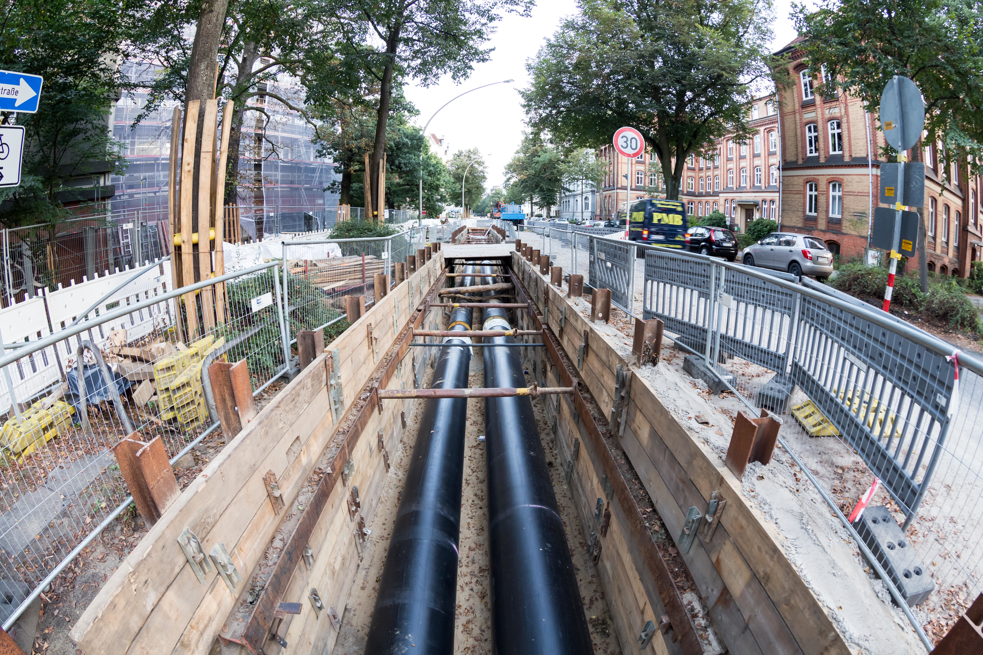 Laying district heating pipes