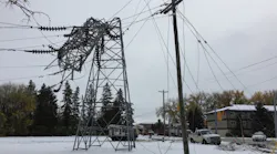 Damaged electric transmission tower, pole, and overhead lines