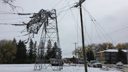 Damaged electric transmission tower, pole, and overhead lines Damaged electric transmission tower, pole, and overhead lines