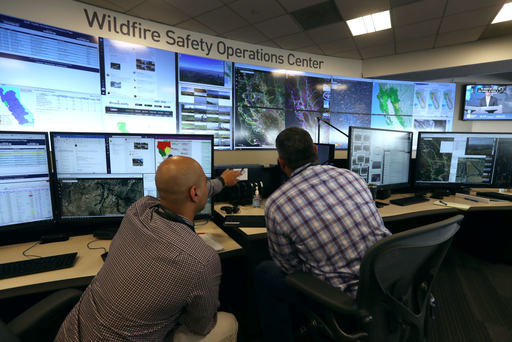 Men working in the PG&E operations center