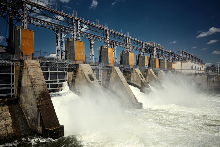 Water flowing through a dam