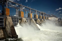 Water flowing through a dam Water flowing through a dam
