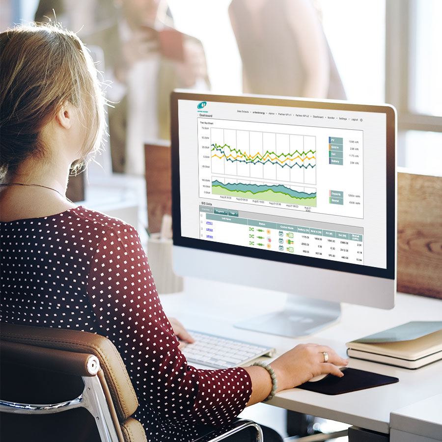 A woman working with data on a computer