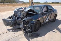 Figure 11 showing damaged test vehicle Figure 11 showing damaged test vehicle