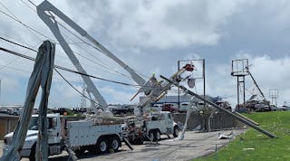 Ameren Missouri crews work to restore lines downed by a major tornado (EF-3) strike in Jefferson City, Missouri, on May 30.