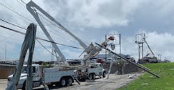 Ameren Missouri crews work to restore lines downed by a major tornado strike Ameren Missouri crews work to restore lines downed by a major tornado strike
