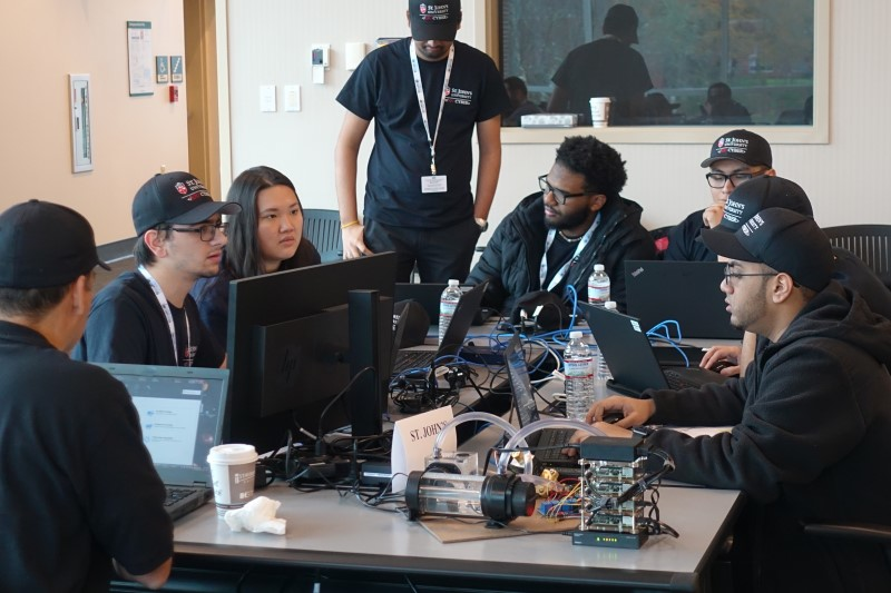 The St. John&rsquo;s University team prepares to compete at ORNL during the December 2018 CyberForce event