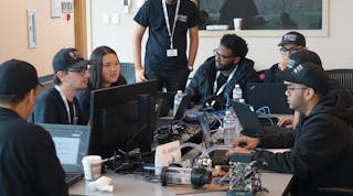 The St. John&rsquo;s University team prepares to compete at ORNL during the December 2018 CyberForce event. Image courtesy of Jeffrey A. Nichols/Oak Ridge National Laboratory, U.S. Dept. of Energy.
