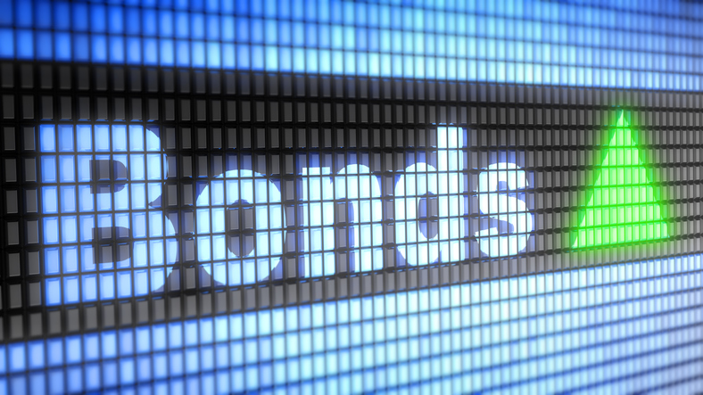 The word 'Bonds' written on a digital medium with a green triangle beside it