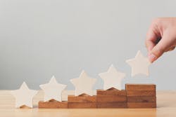 Stars on top of stacked wooden blocks Stars on top of stacked wooden blocks