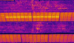 This solar plant was inspected by drone with an infrared camera. The bright yellow section shown here lets technicians know that there is likely an issue that needs to be inspected based on the heat of the panel.
