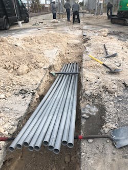 Installing conduit to the feeder location in the generator switchyard. Installing conduit to the feeder location in the generator switchyard.