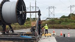 A utility worker and equipment A utility worker and equipment