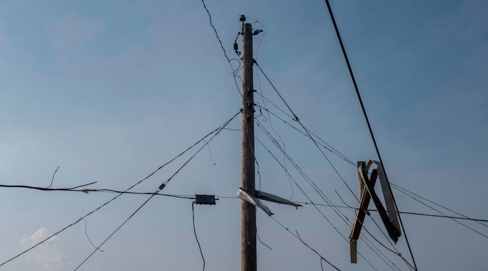 Downed power lines are seen in Dayton, Ohio, on May 28, 2019, after powerful tornadoes ripped through the US state overnight, causing at least one fatality and widespread damage and power outages.