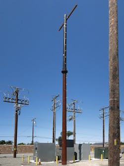 Valmont Hybrid Pole with a steel base section and a FRP top section combines the fire resistance of steel with the insulating properties of a FRP pole. Valmont Hybrid Pole with a steel base section and a FRP top section combines the fire resistance of steel with the insulating properties of a FRP pole.