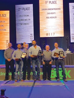 The winning journeyman team in the hurtman rescue event celebrates their win. The winning journeyman team in the hurtman rescue event celebrates their win.